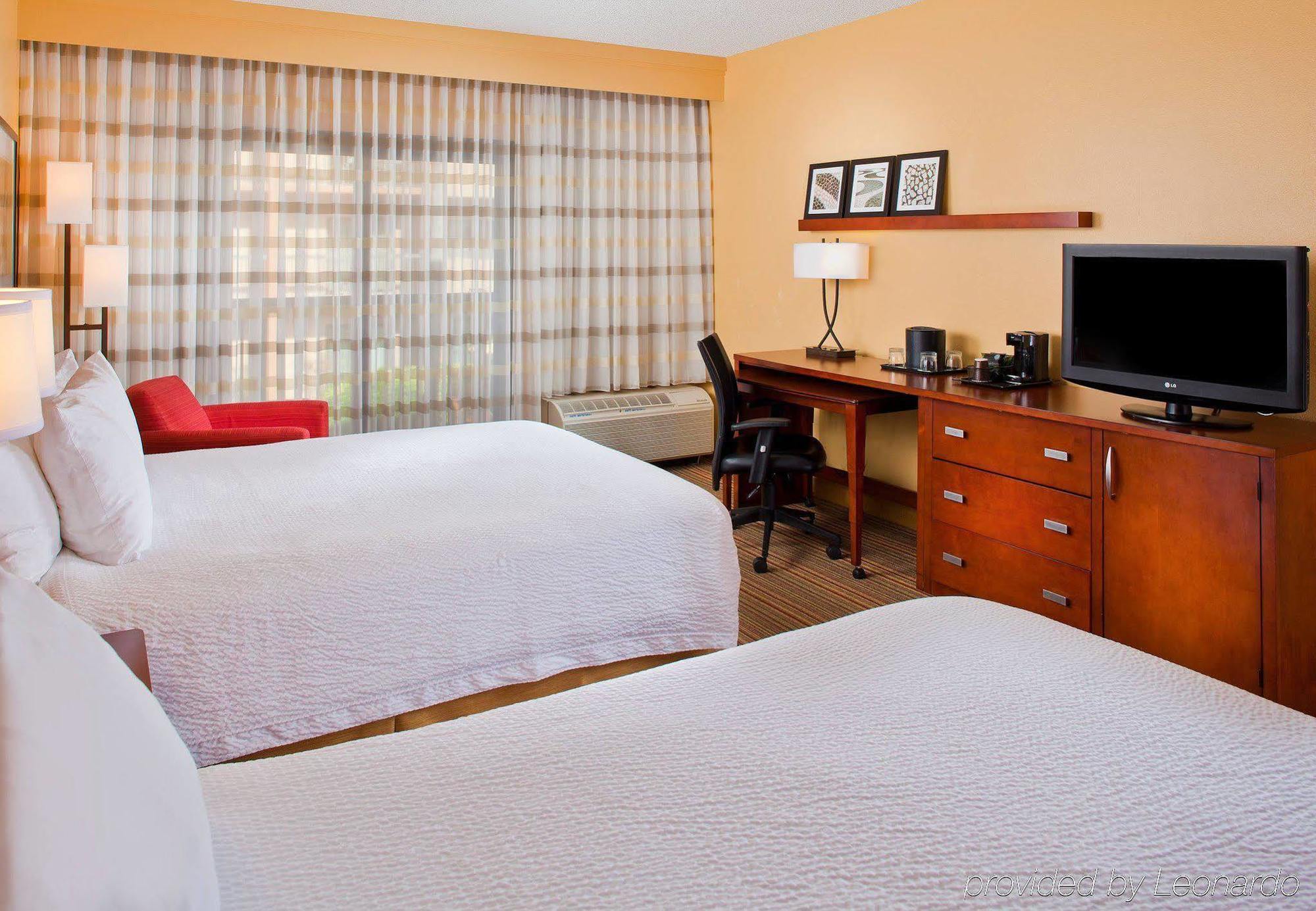 Готель Courtyard By Marriott Orlando Airport Екстер'єр фото