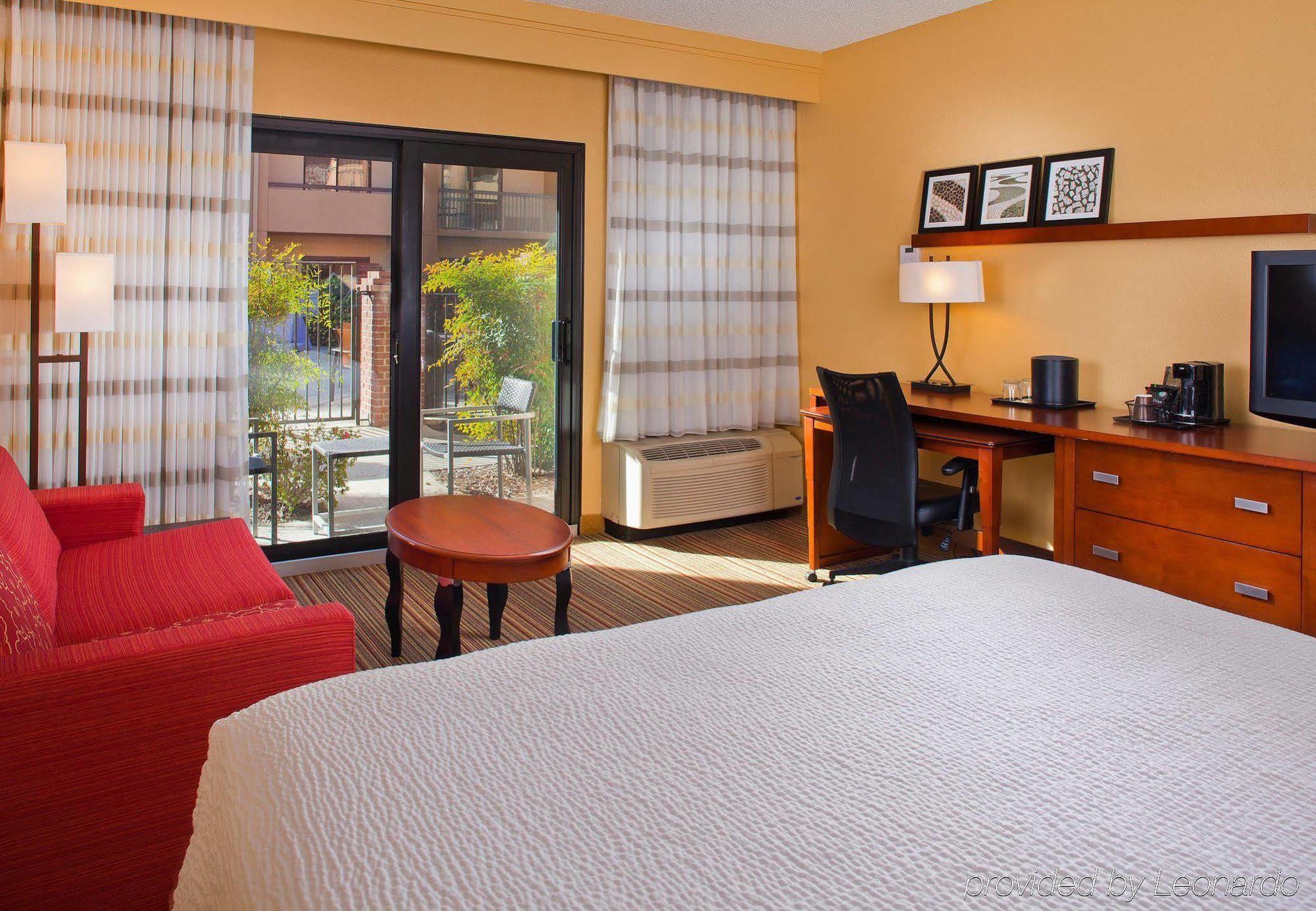 Готель Courtyard By Marriott Orlando Airport Екстер'єр фото